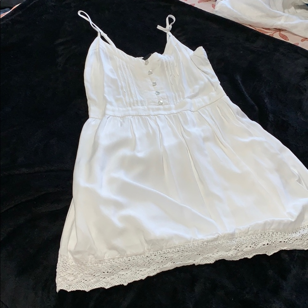White sundress with button and lace detailing